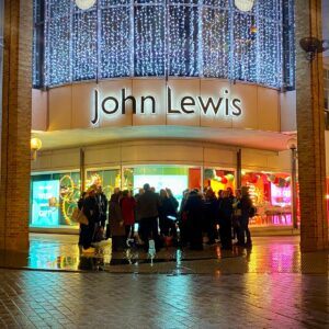 Carol singing in the cold and wet night outside John Lewis!